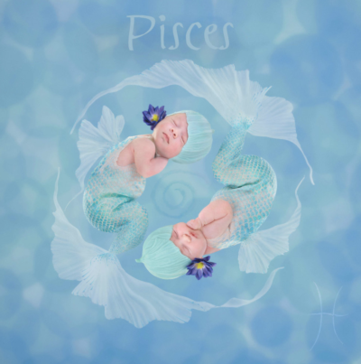 anne geddes photo of babies dresses as fish to represent the astrological sign pisces