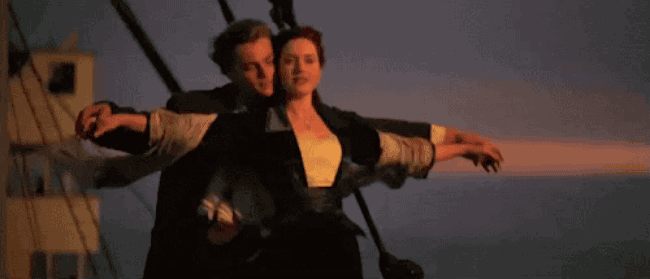 jack and rose on the deck of the ship in the movie titanic