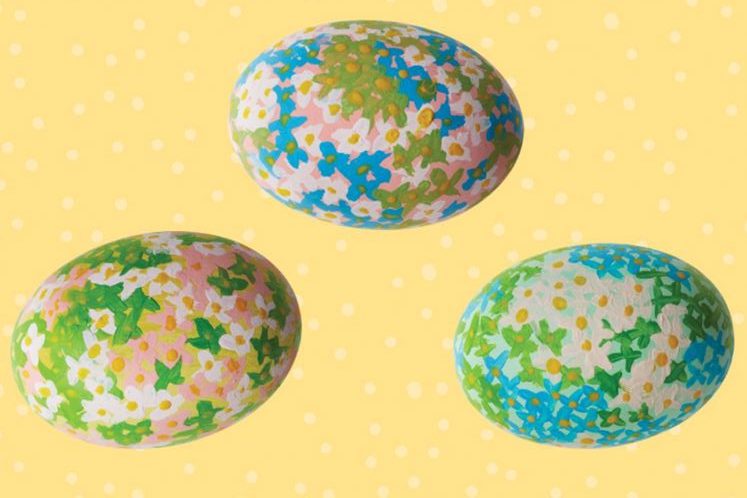 easter eggs decorated by drawing simple flowers on them