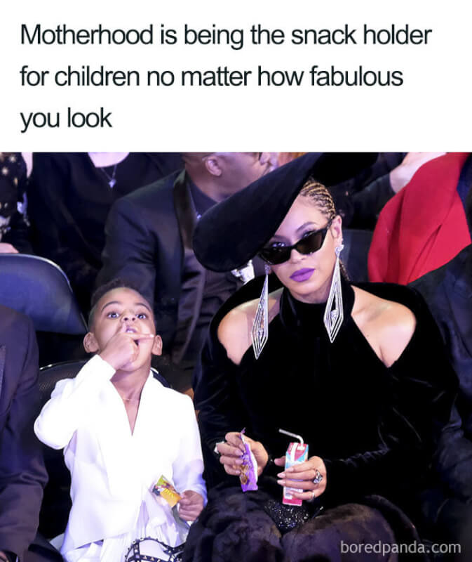 motherhood is being the snack holder for children no matter how fabulous you look | image: beyonce holding snack for blue ivy carter