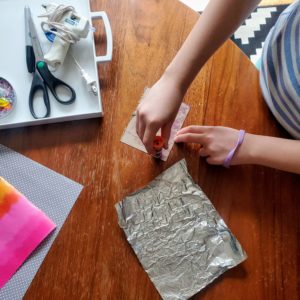 DIY Kaleidoscope: glue the foil onto the cardboard